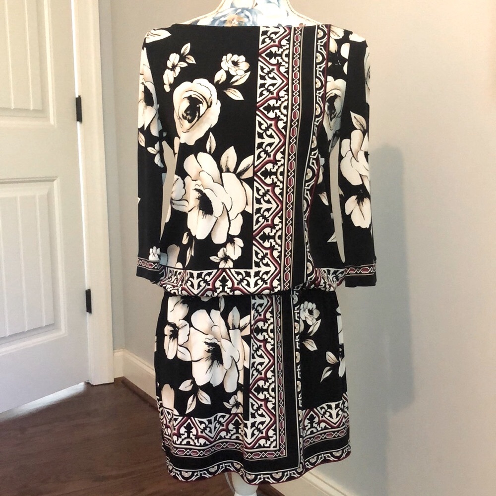 White House/Black Market short dress. Elastic at waist so it flounces over.
